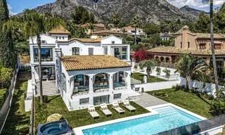 Refined luxury villa in modern Mediterranean style for sale with sea views in a gated complex on Marbella's Golden Mile 778771 
