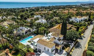 Refined luxury villa in modern Mediterranean style for sale with sea views in a gated complex on Marbella's Golden Mile 778773 