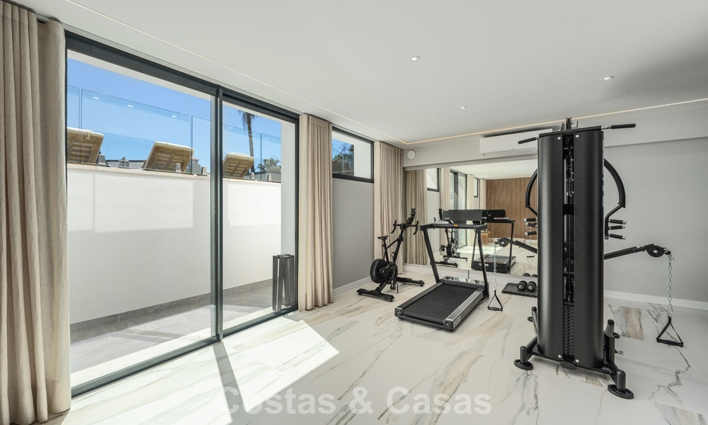 Refined luxury villa in modern Mediterranean style for sale with sea views in a gated complex on Marbella's Golden Mile 778774