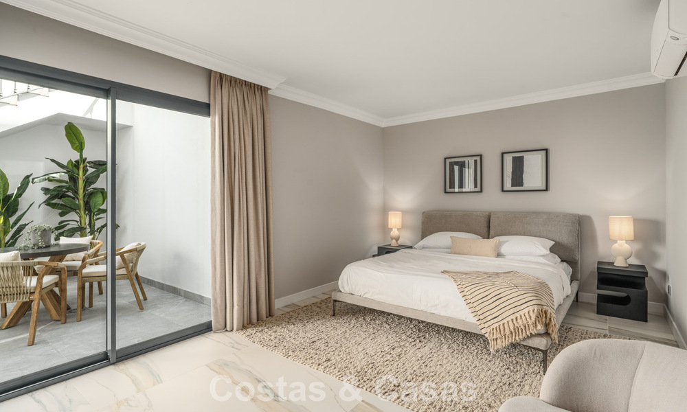 Refined luxury villa in modern Mediterranean style for sale with sea views in a gated complex on Marbella's Golden Mile 778776