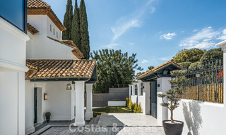 Refined luxury villa in modern Mediterranean style for sale with sea views in a gated complex on Marbella's Golden Mile 778777 