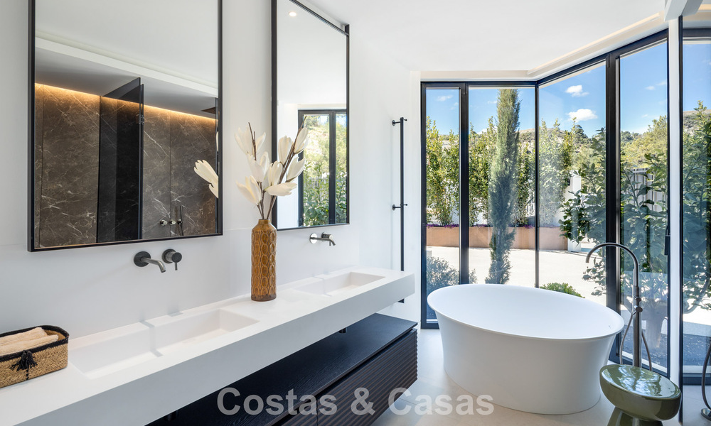 Sophisticated, new, luxury villa with panoramic sea views for sale in a gated community of La Quinta, Marbella - Benahavis 800530
