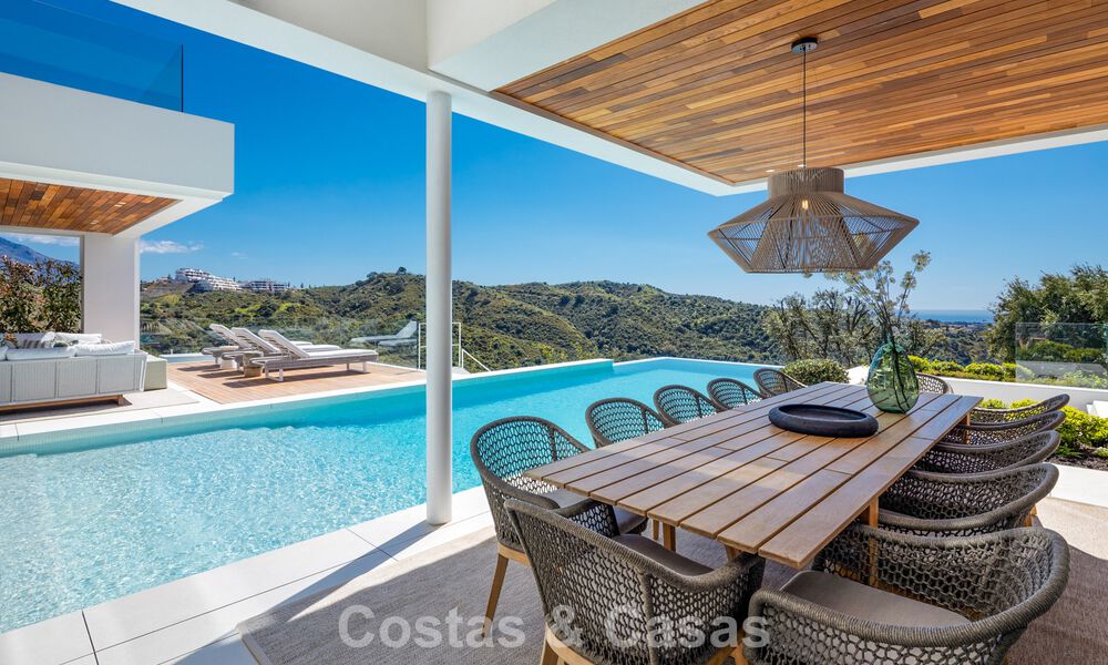 Sophisticated, new, luxury villa with panoramic sea views for sale in a gated community of La Quinta, Marbella - Benahavis 800534
