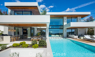Sophisticated, new, luxury villa with panoramic sea views for sale in a gated community of La Quinta, Marbella - Benahavis 800536 