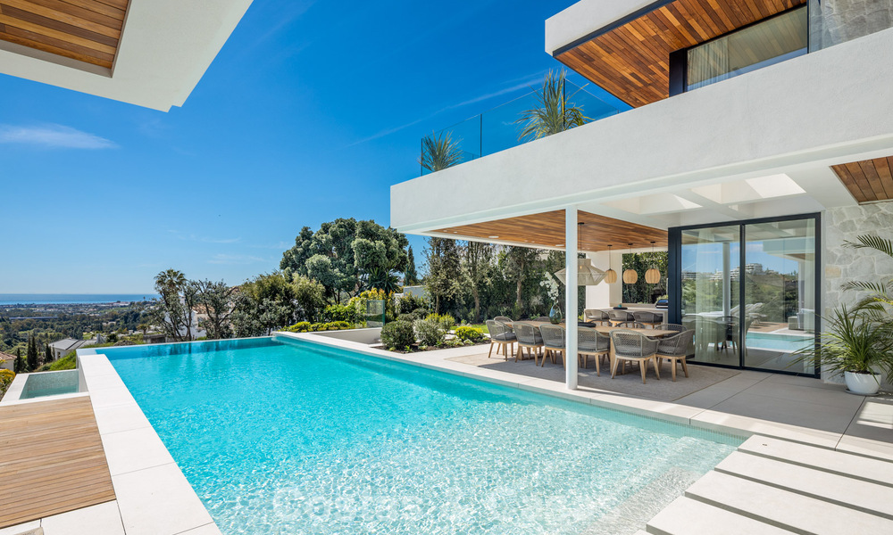 Sophisticated, new, luxury villa with panoramic sea views for sale in a gated community of La Quinta, Marbella - Benahavis 800537