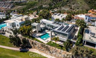 Move-in ready modern villa for sale, bordering the golf course in a sought-after residential area of Marbella - Benahavis 778709 