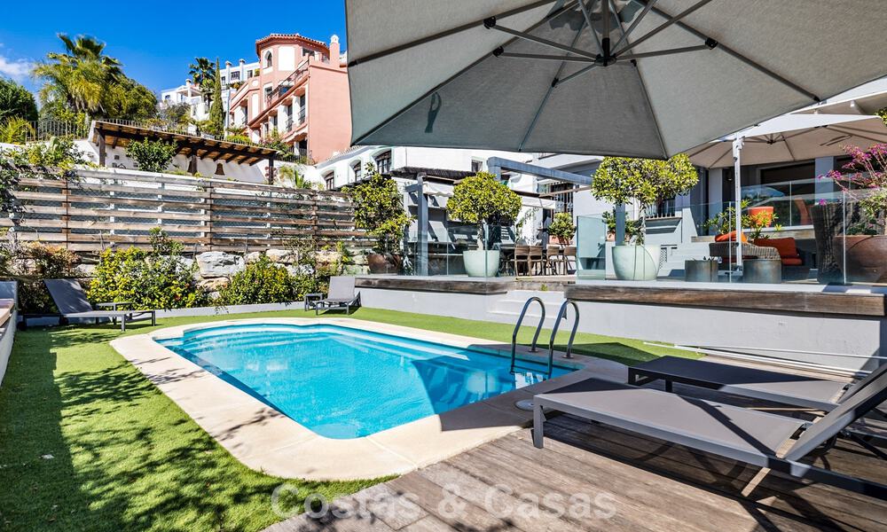 Spacious townhouse for sale with sea views in a gated urbanization in the hills of Marbella - Benahavis 778940