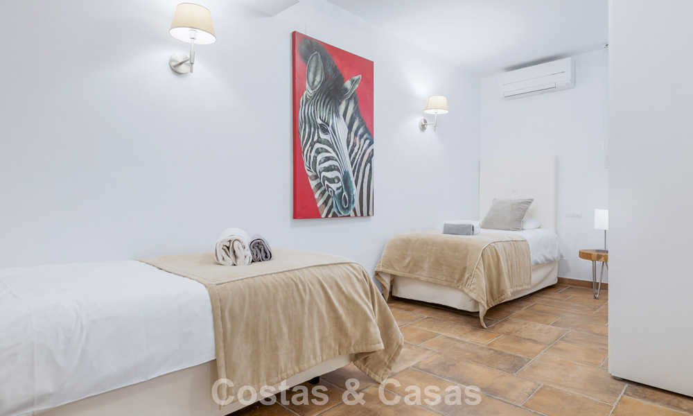 Spacious townhouse for sale with sea views in a gated urbanization in the hills of Marbella - Benahavis 778946