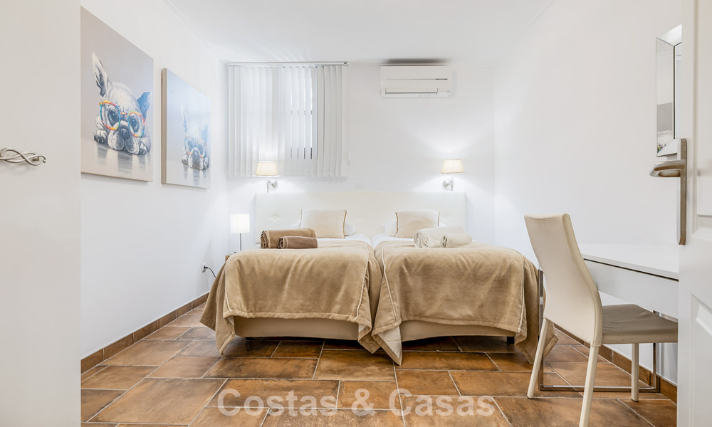 Spacious townhouse for sale with sea views in a gated urbanization in the hills of Marbella - Benahavis 778947