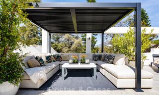 Frontline golf penthouse with stunning golf and sea views for sale in a gated community of Nueva Andalucia, Marbella 779087 