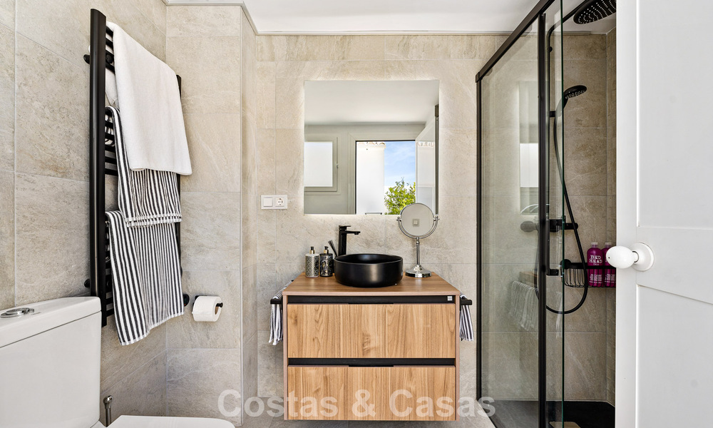 Frontline golf penthouse with stunning golf and sea views for sale in a gated community of Nueva Andalucia, Marbella 779090