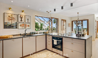 Frontline golf penthouse with stunning golf and sea views for sale in a gated community of Nueva Andalucia, Marbella 779101 