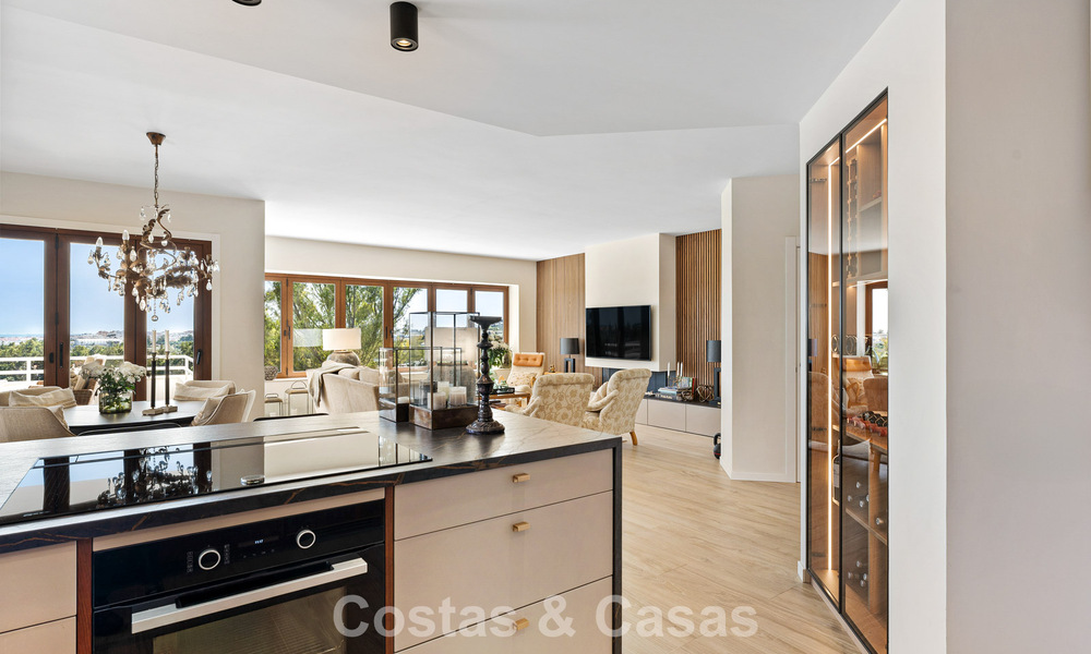 Frontline golf penthouse with stunning golf and sea views for sale in a gated community of Nueva Andalucia, Marbella 779102