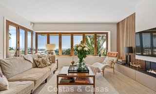 Frontline golf penthouse with stunning golf and sea views for sale in a gated community of Nueva Andalucia, Marbella 779105 