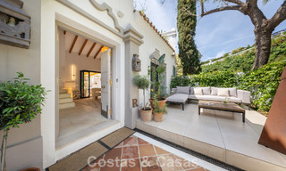 Beautifully renovated townhouse in a timeless Andalusian style with sea views for sale on Marbella's Golden Mile 778958 
