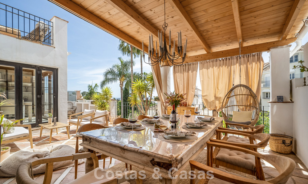 Beautifully renovated townhouse in a timeless Andalusian style with sea views for sale on Marbella's Golden Mile 778961