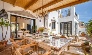 Beautifully renovated townhouse in a timeless Andalusian style with sea views for sale on Marbella's Golden Mile 778962 