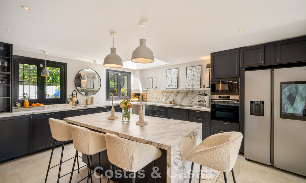 Beautifully renovated townhouse in a timeless Andalusian style with sea views for sale on Marbella's Golden Mile 778968
