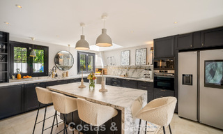 Beautifully renovated townhouse in a timeless Andalusian style with sea views for sale on Marbella's Golden Mile 778968 