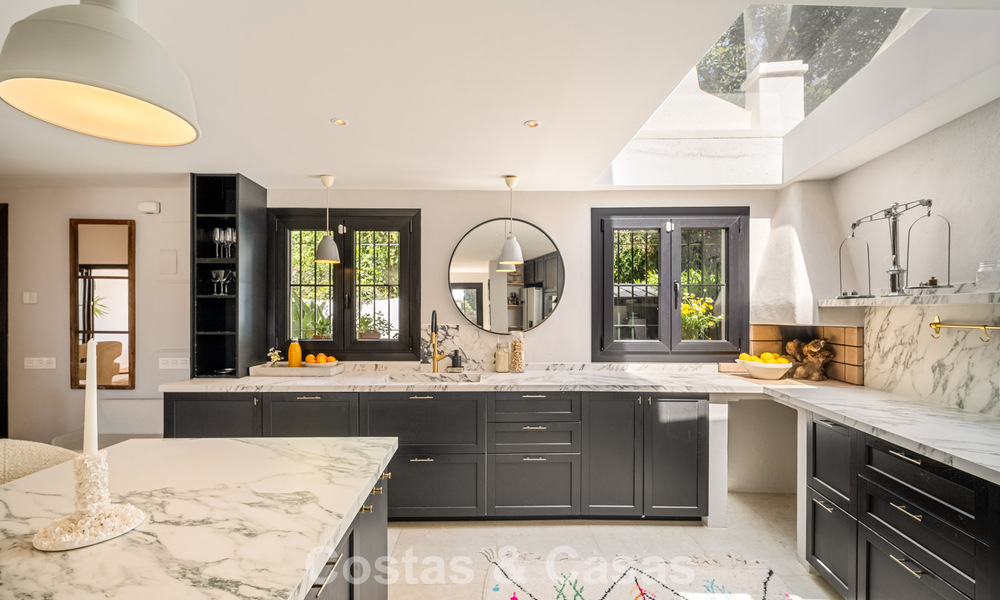 Beautifully renovated townhouse in a timeless Andalusian style with sea views for sale on Marbella's Golden Mile 778971