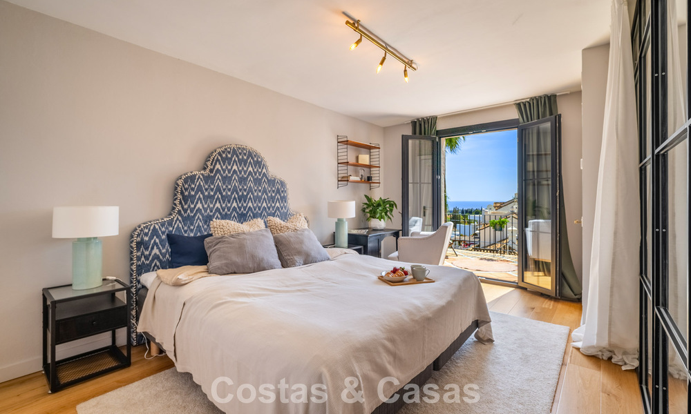 Beautifully renovated townhouse in a timeless Andalusian style with sea views for sale on Marbella's Golden Mile 778973