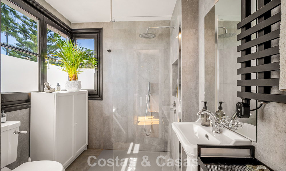 Beautifully renovated townhouse in a timeless Andalusian style with sea views for sale on Marbella's Golden Mile 778977