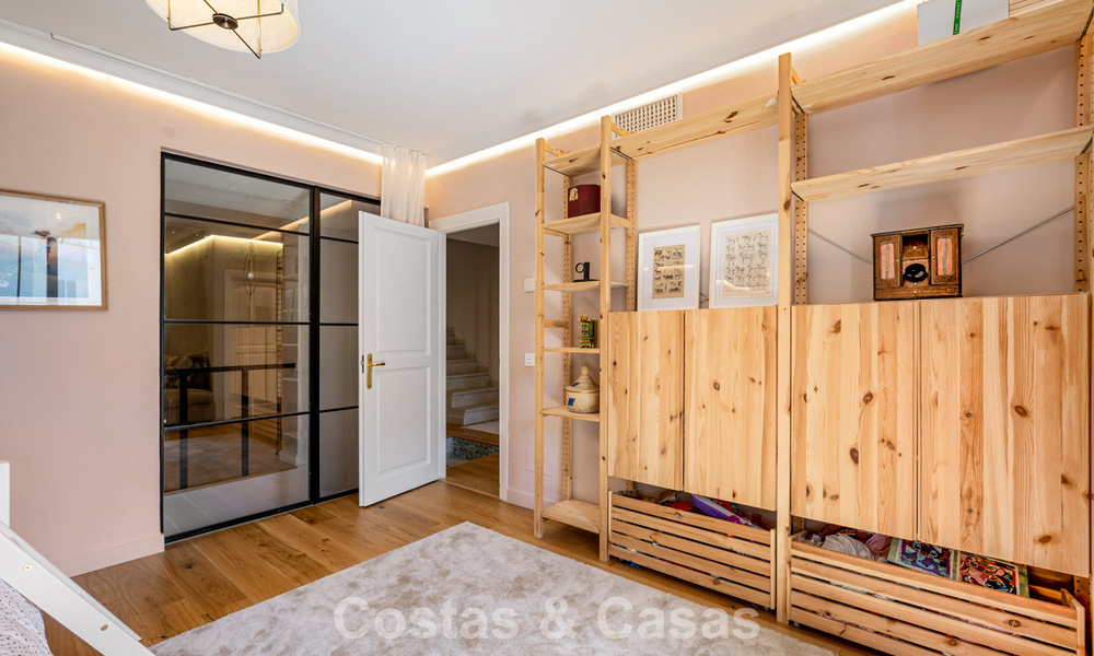 Beautifully renovated townhouse in a timeless Andalusian style with sea views for sale on Marbella's Golden Mile 778984