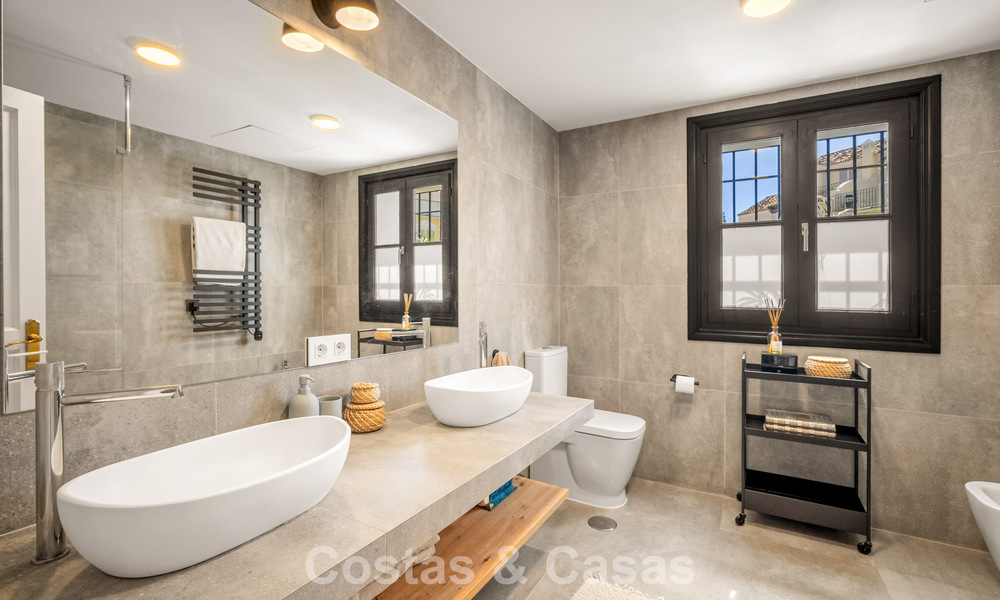 Beautifully renovated townhouse in a timeless Andalusian style with sea views for sale on Marbella's Golden Mile 778985