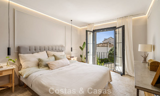 Beautifully renovated townhouse in a timeless Andalusian style with sea views for sale on Marbella's Golden Mile 778986 