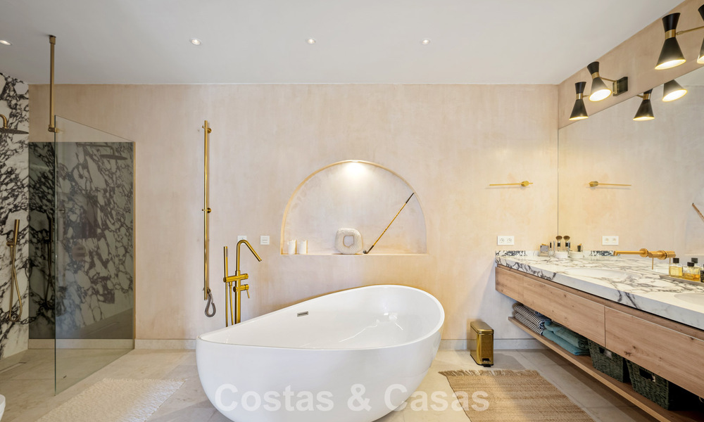 Beautifully renovated townhouse in a timeless Andalusian style with sea views for sale on Marbella's Golden Mile 778989