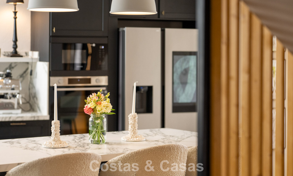 Beautifully renovated townhouse in a timeless Andalusian style with sea views for sale on Marbella's Golden Mile 778992