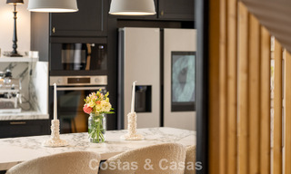 Beautifully renovated townhouse in a timeless Andalusian style with sea views for sale on Marbella's Golden Mile 778992 