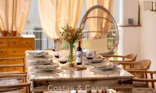 Beautifully renovated townhouse in a timeless Andalusian style with sea views for sale on Marbella's Golden Mile 778994 