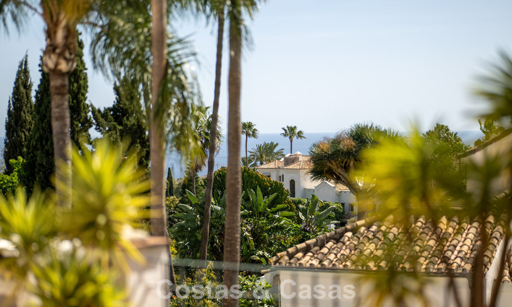 Beautifully renovated townhouse in a timeless Andalusian style with sea views for sale on Marbella's Golden Mile 778995