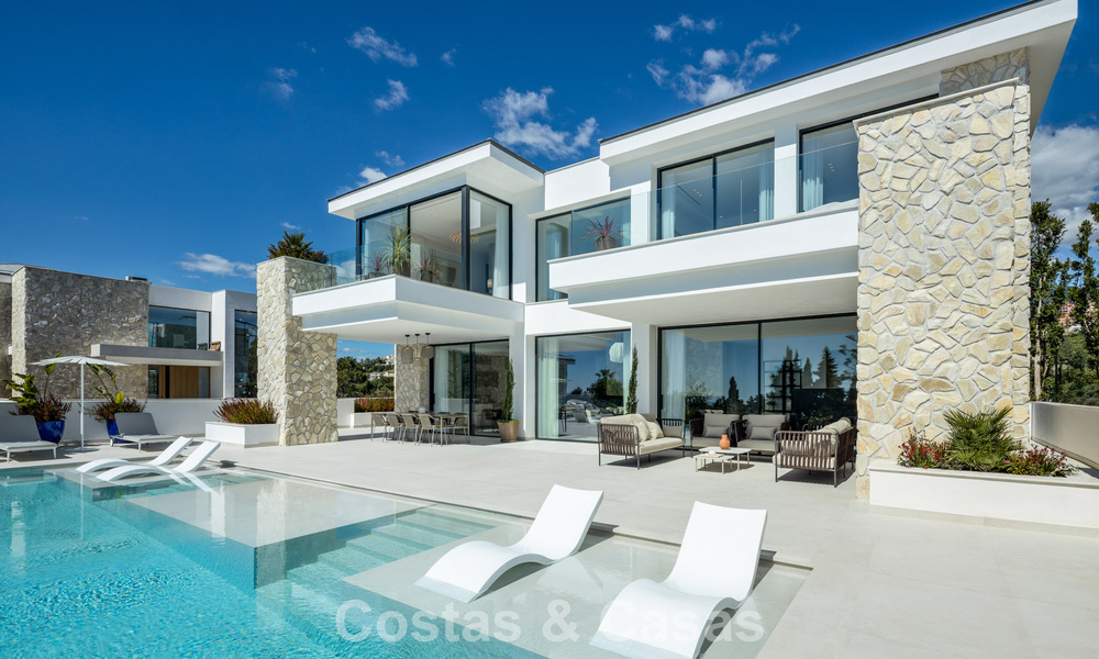 Brand new modernist luxury villa for sale in the exclusive gated community of La Quinta, Marbella - Benahavis 779017