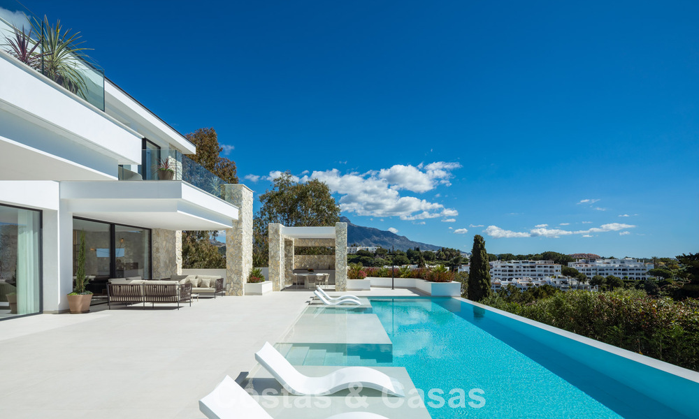 Brand new modernist luxury villa for sale in the exclusive gated community of La Quinta, Marbella - Benahavis 779018