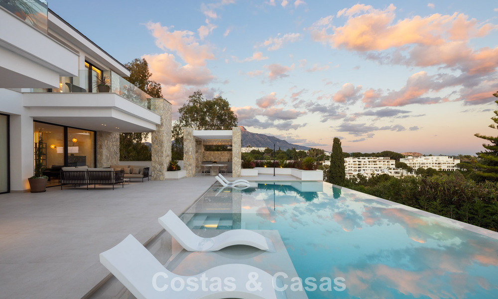 Brand new modernist luxury villa for sale in the exclusive gated community of La Quinta, Marbella - Benahavis 779034