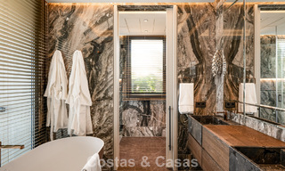 Move-in ready, state-of-the-art luxury villa for sale just a stone's throw from the beach on Marbella's coveted Golden Mile 779383 