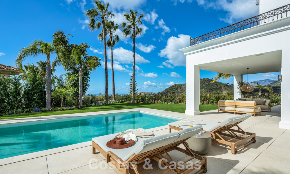 Spacious villa with luxurious Mediterranean architecture for sale, bordering the golf course in Marbella - Benahavis 779645