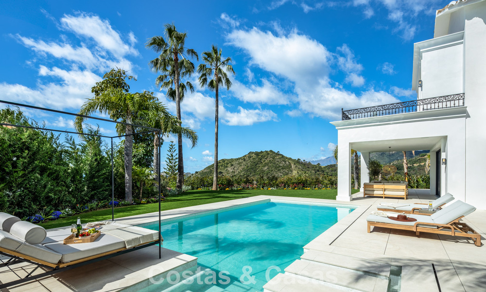 Spacious villa with luxurious Mediterranean architecture for sale, bordering the golf course in Marbella - Benahavis 779647