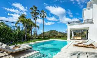 Spacious villa with luxurious Mediterranean architecture for sale, bordering the golf course in Marbella - Benahavis 779647 