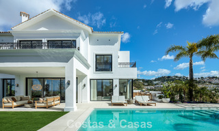 Spacious villa with luxurious Mediterranean architecture for sale, bordering the golf course in Marbella - Benahavis 779649 