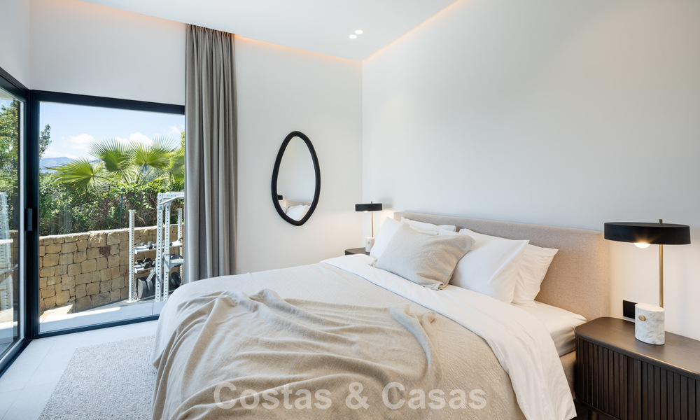 Spacious villa with luxurious Mediterranean architecture for sale, bordering the golf course in Marbella - Benahavis 779670