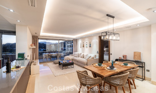 Contemporary apartment with panoramic golf and sea views for sale in Marbella - Benahavis 779779 