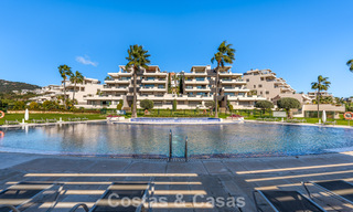Contemporary apartment with panoramic golf and sea views for sale in Marbella - Benahavis 779784 