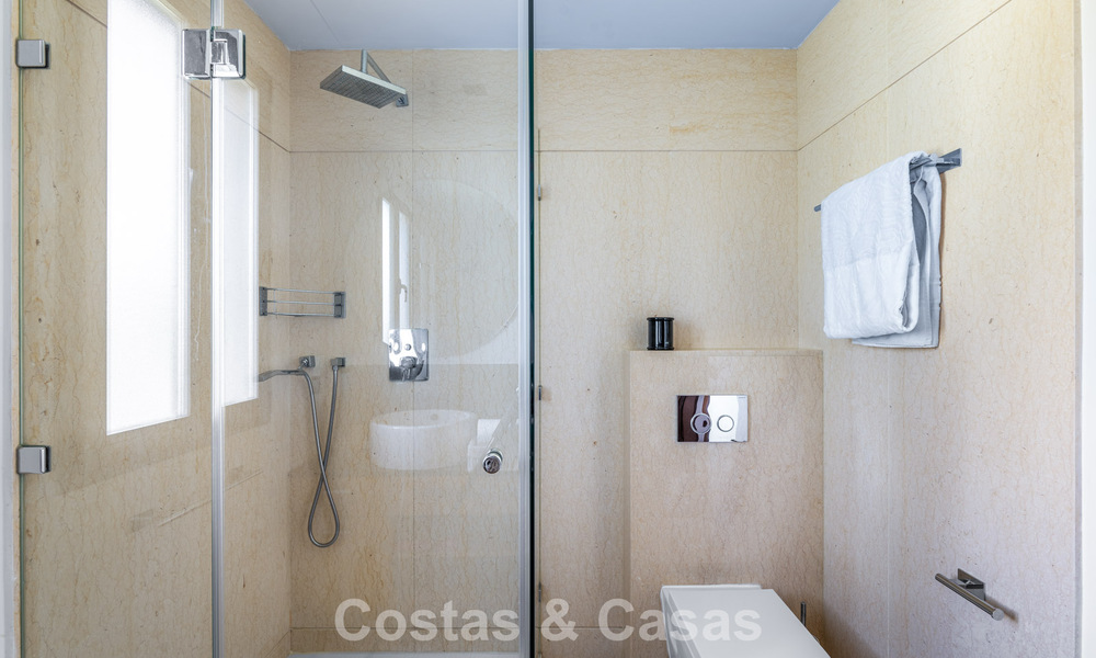 Contemporary apartment with panoramic golf and sea views for sale in Marbella - Benahavis 779791