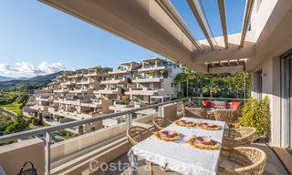 Contemporary apartment with panoramic golf and sea views for sale in Marbella - Benahavis 779797 