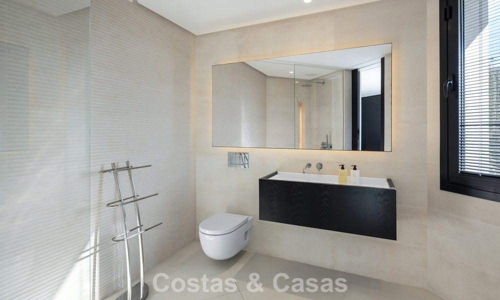 Avant-garde designer villa with panoramic sea views for sale in a gated community in Benahavis - Marbella 779978