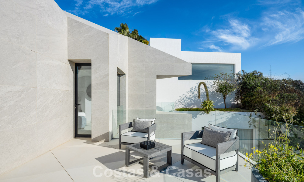 Avant-garde designer villa with panoramic sea views for sale in a gated community in Benahavis - Marbella 779979