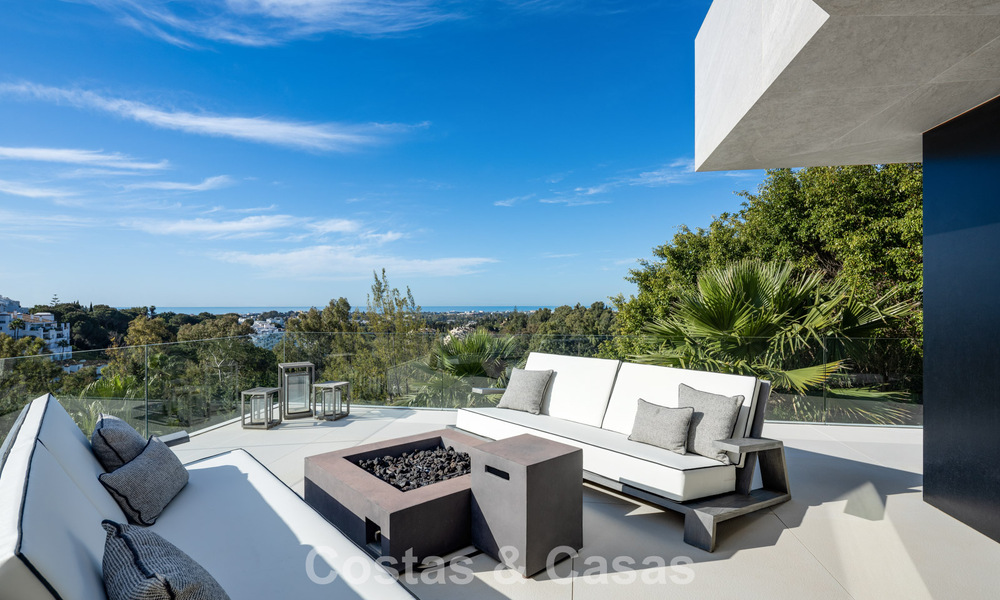 Avant-garde designer villa with panoramic sea views for sale in a gated community in Benahavis - Marbella 779980